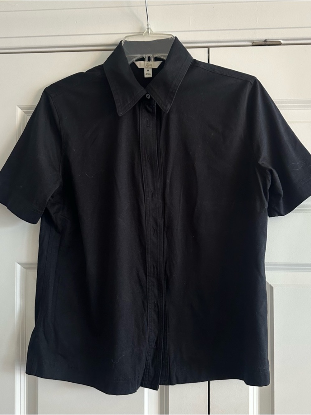 Ladies black button down polo shirt.  Cotton. Medium